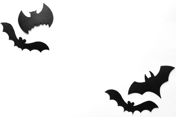 Fototapeta premium Halloween background, black bats on white background,hand made fall decor.