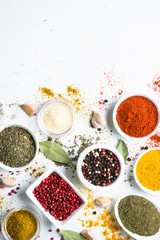 Obraz na płótnie Canvas Set of spices in a bowls on white background.