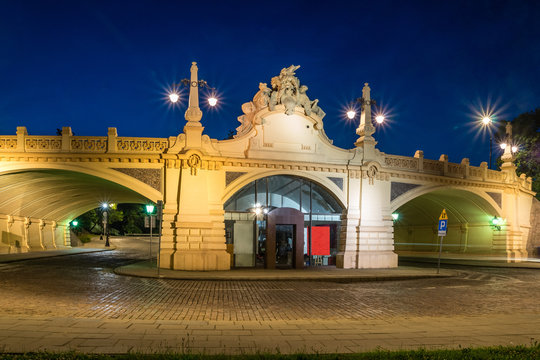 Historic viaduct on the Karowa street at night in Warsaw, Poland