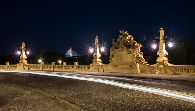 Historic viaduct on the Karowa street at night in Warsaw, Poland