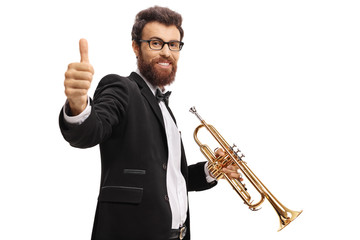 Trumpet player making a thumb up gesture
