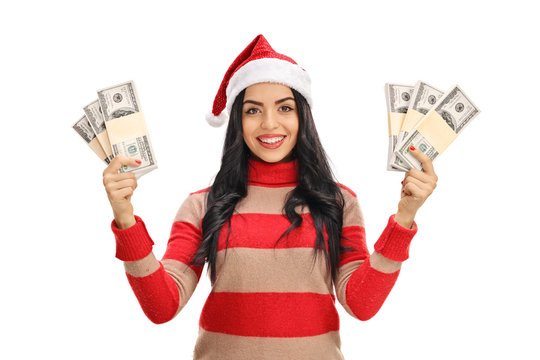 Young Woman With A Christmas Hat With Money Bundles