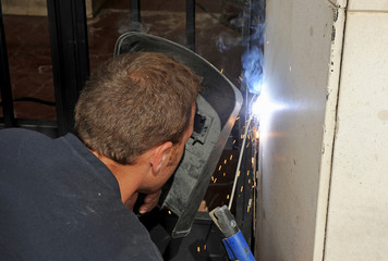 Fototapeta na wymiar Arc welding, new entrance door