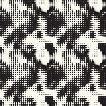 Seamless pattern ethnic style. Stylized animal skin imitation. Halftone textile print. Tribal fashion background. Black and white design.