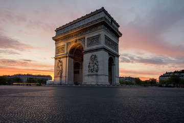 Arc de Triomphe and Champs Elysees, Landmarks in center of Paris, at sunset. Paris, France