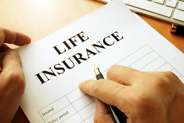 Life insurance policy on a table.