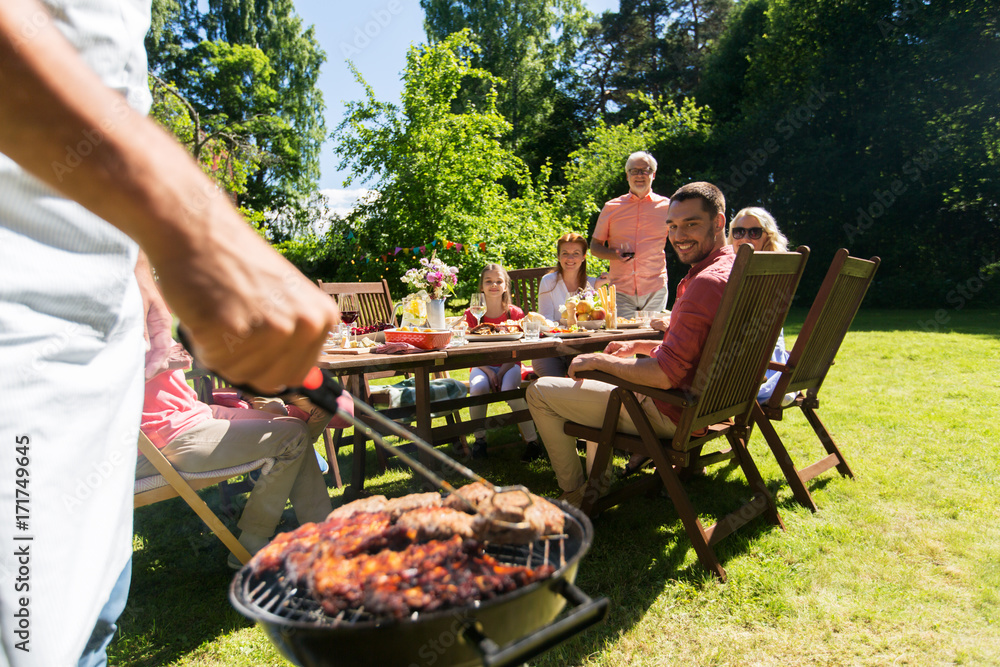 Canvas Prints man cooking meat on barbecue grill at summer party