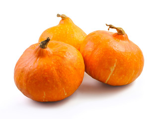Three pumpkins isolated on white background
