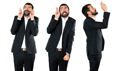 Set of Handsome businessman with his fingers crossing