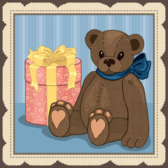 Postcard with a teddy bear and a large pink gift box