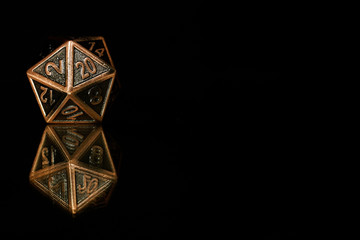 A polyhedral twenty sided die used for role playing games such as Dungeons & Dragons.