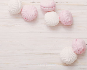 marshmallow on white wooden background