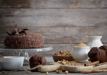 Chocolate cake on old wooden table