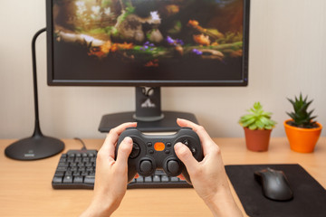 Pllaying on the joystick in a game console