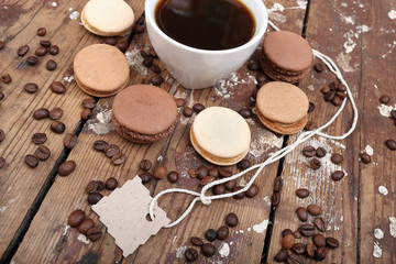 Macaroons and a blank. Macaroons and coffee. Romantic Breakfast.