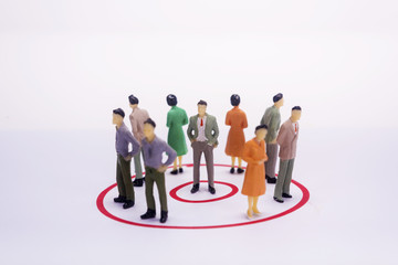Miniature people business man in red circle graph.