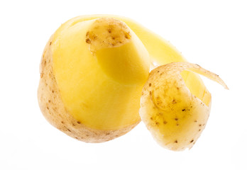 a fresh raw potatoe on a white background