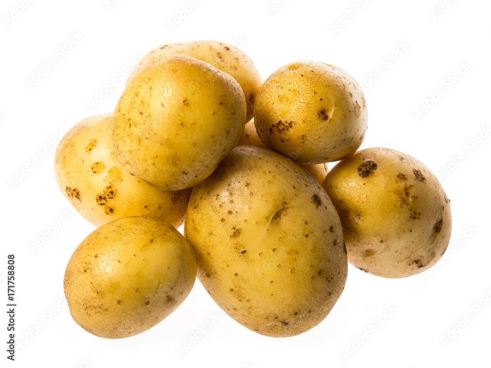 Wall mural a fresh raw potatoes on a white background