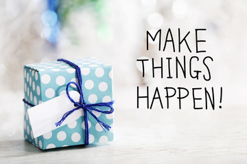 Make Things Happen message with small handmade gift box 