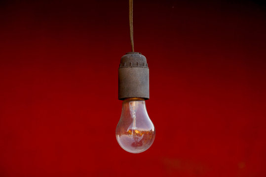 old lamp to red background