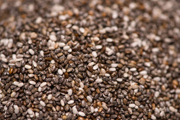 Close-up of raw, unprocessed, dried black chia seeds