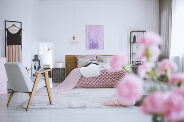 Flowers in chic pink bedroom