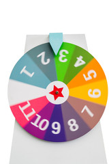 Spinning colorful fortune wheel with white digit numbers isolated on white