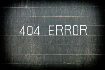 "404 ERROR" Chalk Writing on Old Chalkboard Background.