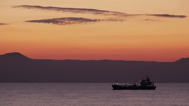 Oil chemical tanker passing by, approaching the shore of Crete.