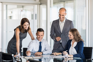 Businesspeople in meeting room