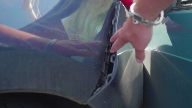 Dented during accident rear bumper of blue car