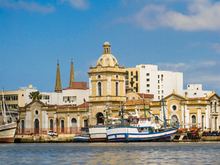 Fototapeta na wymiar A view of Rio Grande's harbor and the Public Market historic building - Rio Grande is the oldest city of Rio Grande do Sul state