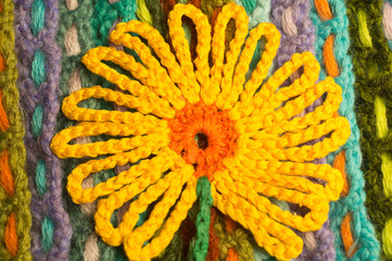 Handmade flower knitted wool colorful texture background