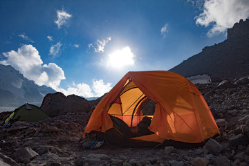 View of the sunrise in the mountains from the tent