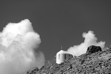 Georgia. Church in the mountains against the background of clouds
