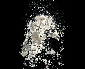 white powder explosion isolated on black background for graphic resources