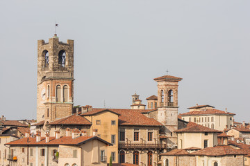 Fototapeta na wymiar Bergamo - Old city (Upper town), Italy. Landscape on the city center, the old towers and the clock towers from the old fortress
