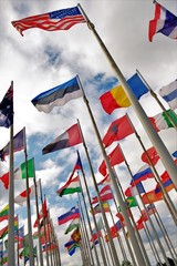 Flags from different countries around the world waving