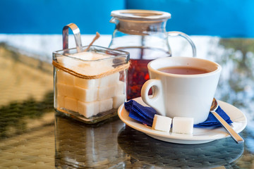 White teaset on tray in restaurant