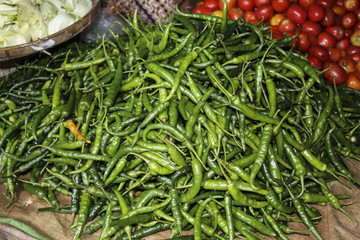 Green chili peppers on the market in Myanmar, Asia