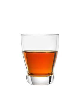 shot of brandy or whiskey on white background