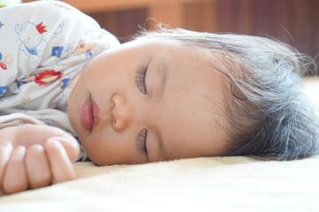 Sleeping toddler girl 1.7 years old