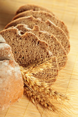 Freshly baked bread on wooden table