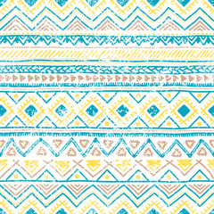 Seamless ethnic pattern. Vintage geometric ornament. Grunge texture. White, blue and yellow colors. Handmade. Bohemian print for textiles.