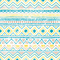 Seamless ethnic pattern. Vintage geometric ornament. Grunge texture. White, blue and yellow colors. Handmade. Bohemian print for textiles.