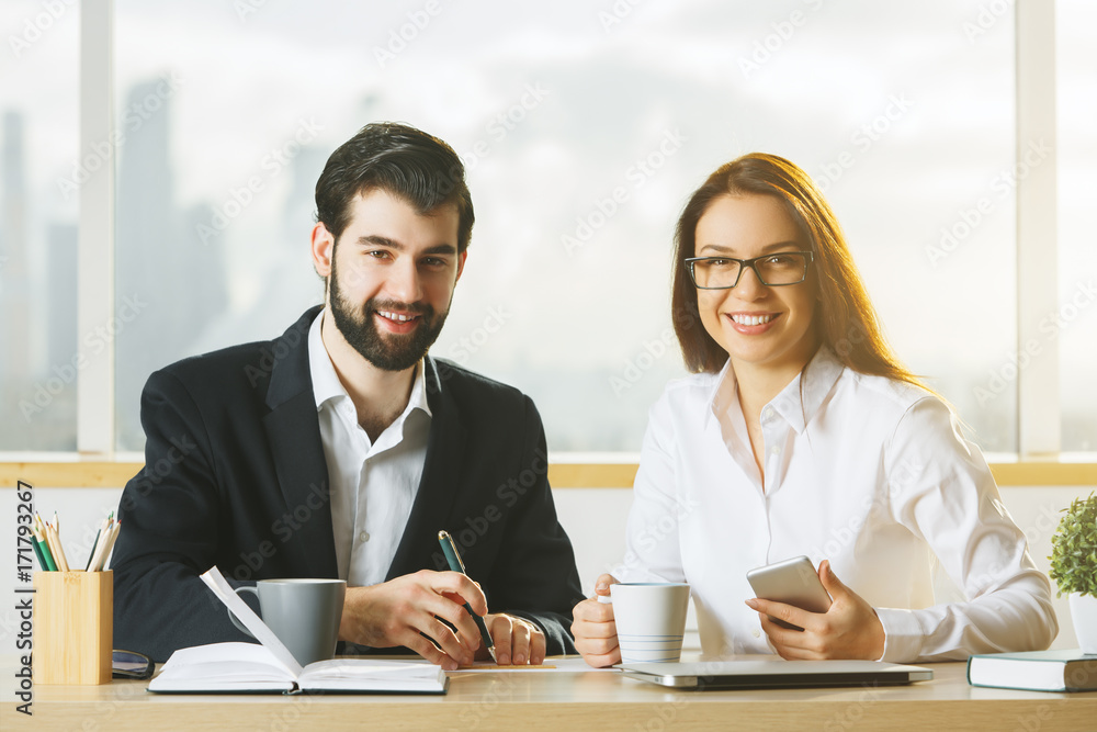 Wall mural white man and woman working together