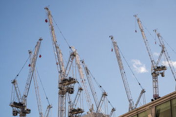 Fototapeta na wymiar Construction Cranes high above London