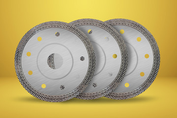 Cutting disks with diamonds - Diamond discs for concrete isolated on the yellow background