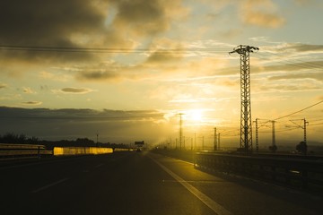 Fototapeta na wymiar Misty morning sunrise on the road. Slovakia