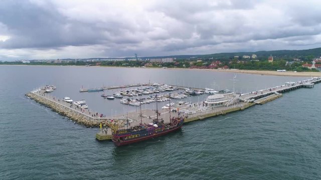 4K aerial footage. Fly over pier marina bay. Sopot.